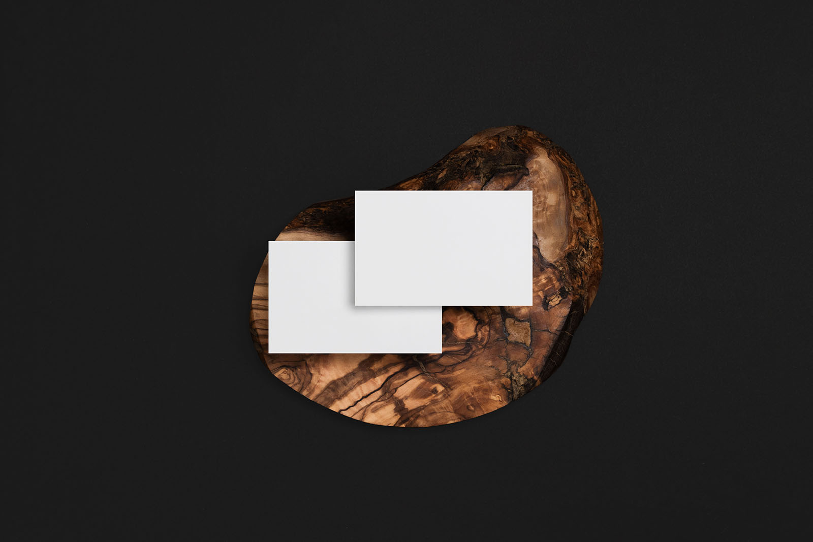 Two business cards with wood mockup